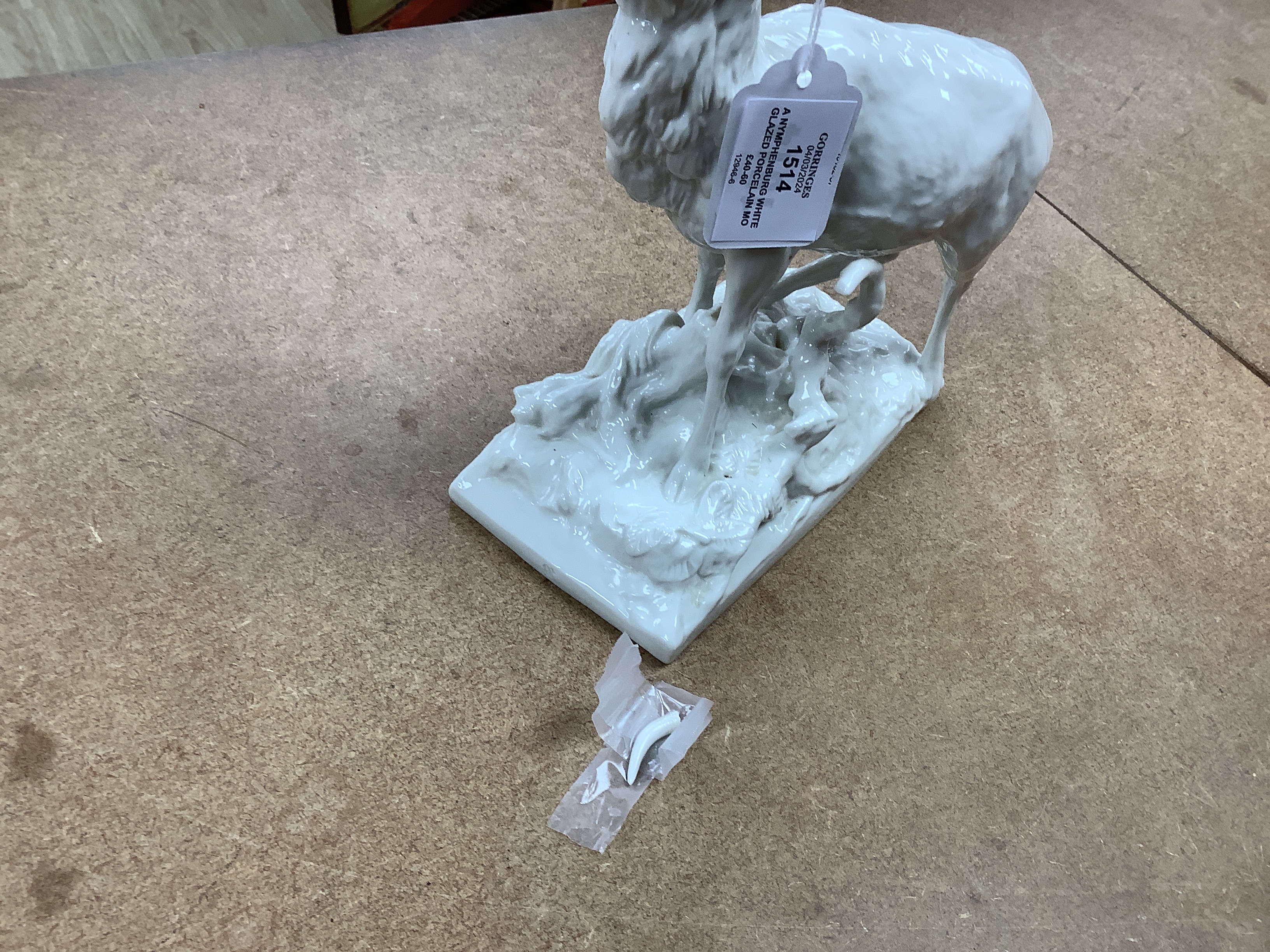 A Nymphenburg white glazed porcelain model of a stag, 31cm high